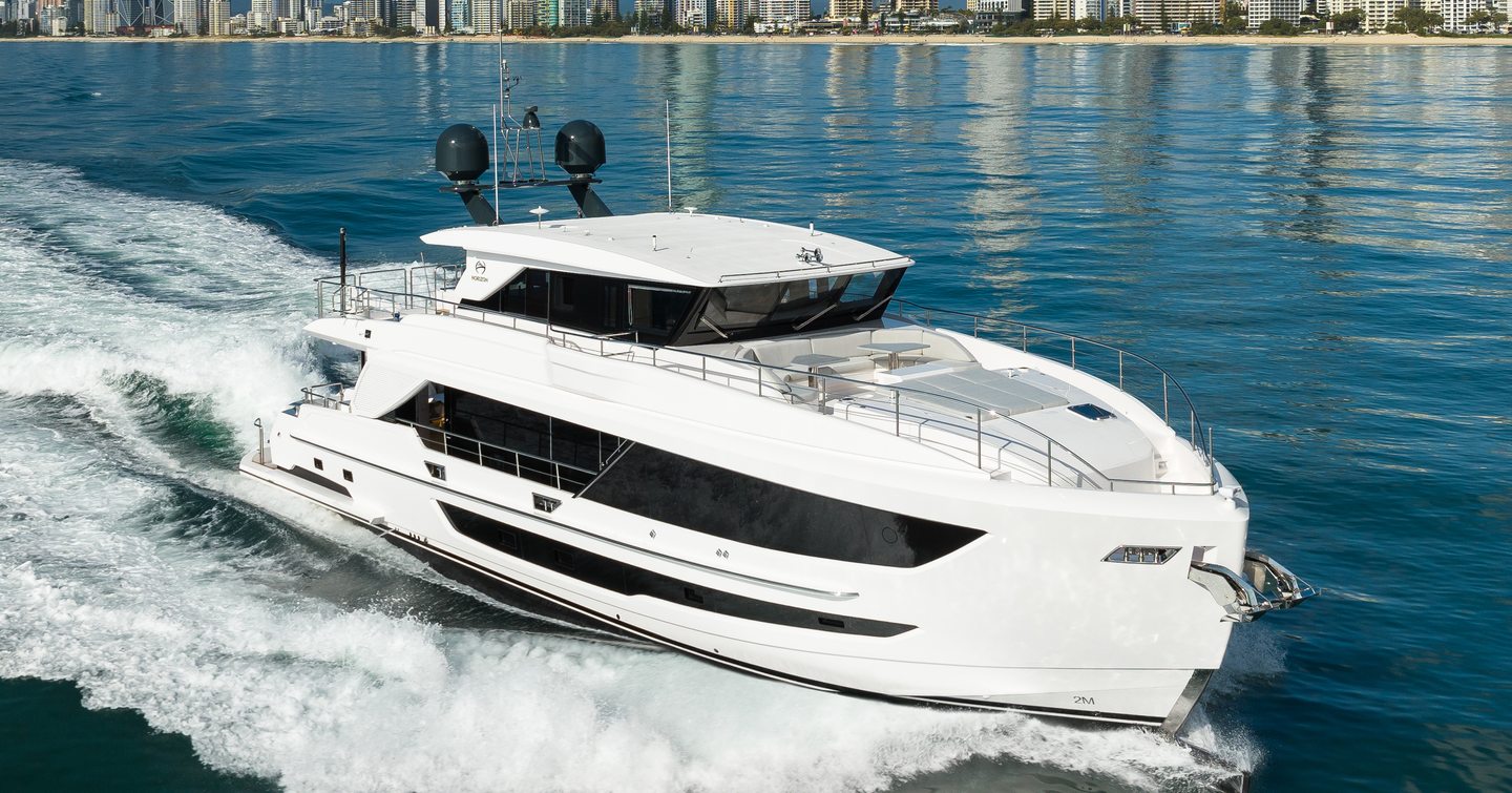 Horizon FD90 Skylounge motor yacht underway at speed