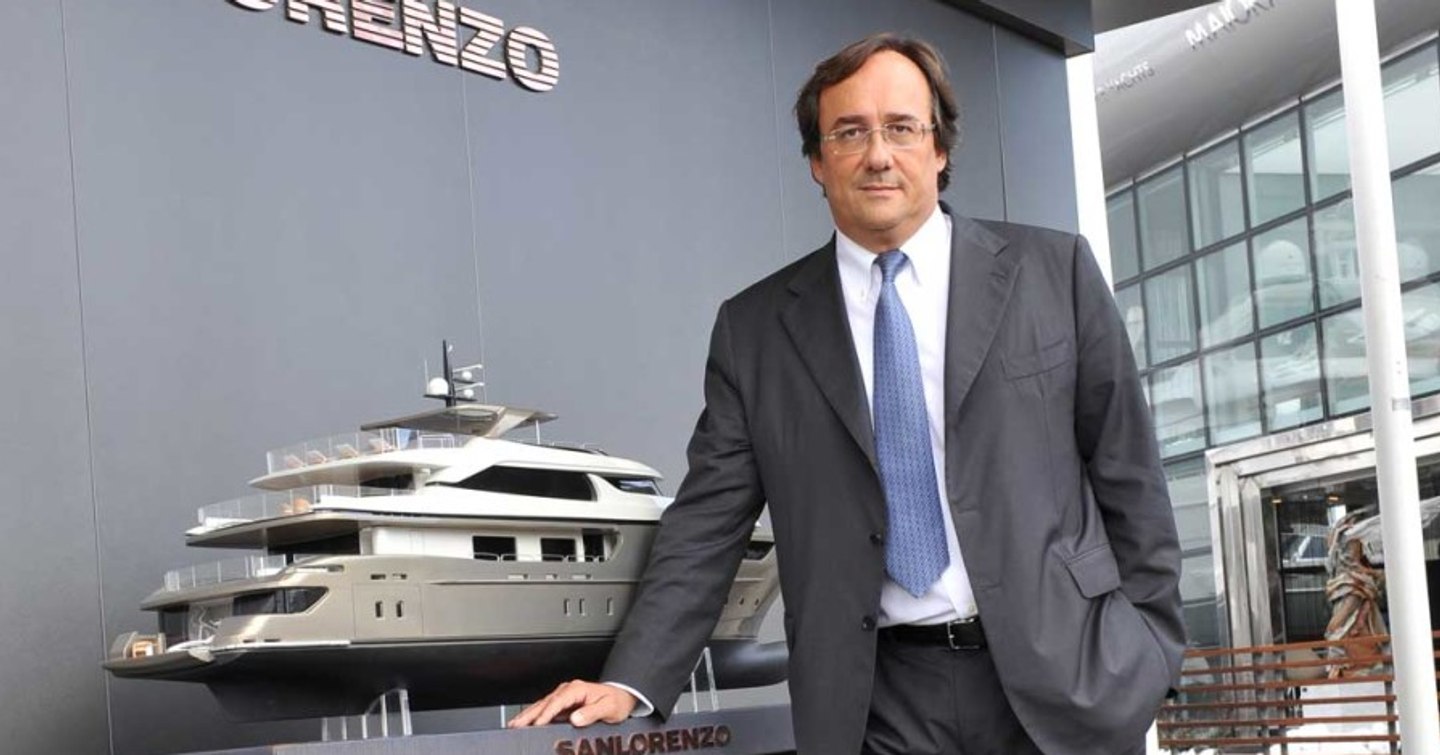 Massimo Perotti the CEO of Sanlorenzo stood in front of a Sanlorenzo model