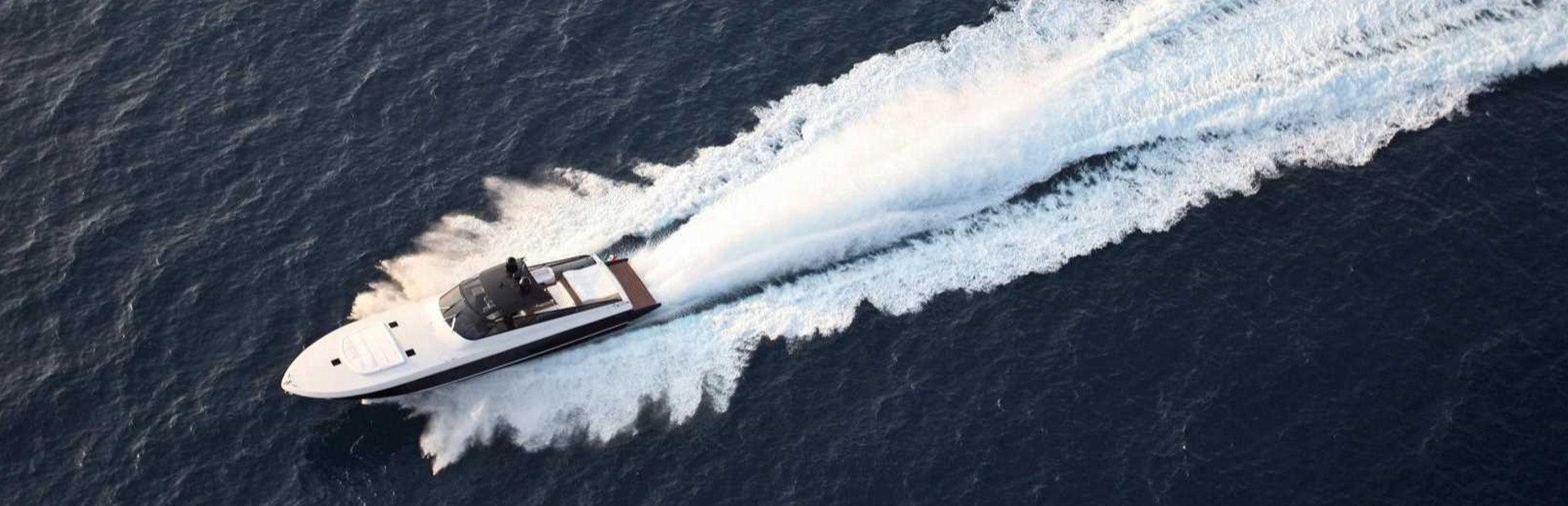 Itama Yachts powerboat moving at speed on water