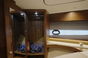 Princess S65 Mk2 VIP cabin wardrobe and port hull window