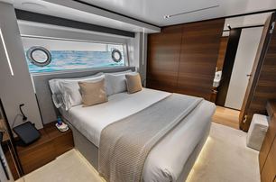 Custom Line superyacht Lumpasaurus guest cabin with large window