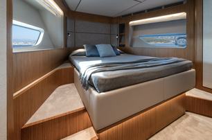Ferretti 670 motor yacht guest cabin with large windows 