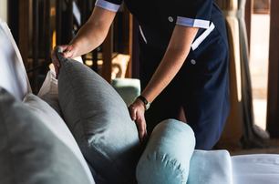 Yacht interior crew wearing uniform for specific duties