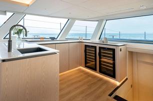 Sunreef Ultima 88 galley with panoramic windows 