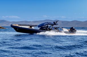 Technohull Alpha 50 boat underway side view 