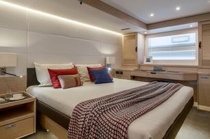 Beneteau Grand Trawler 63 motor yacht master cabin with large window 