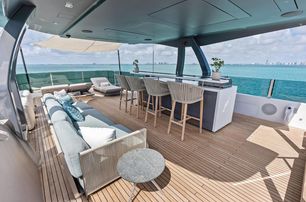 Custom Line superyacht Lumpasaurus sundeck lounge and bar