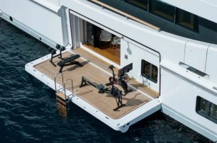 Amels superyacht Synthesis fold out terrace with gym equipment 