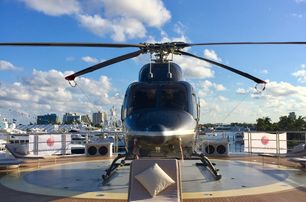 helicopter on superyacht for sale at FLIBS