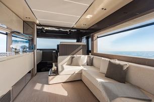 Invictus ST550 motor yacht saloon lounge and galley area