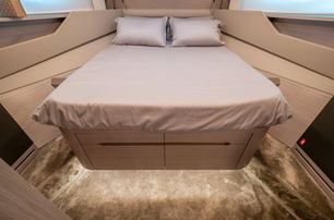 motor yacht Survivor guest cabin with large windows