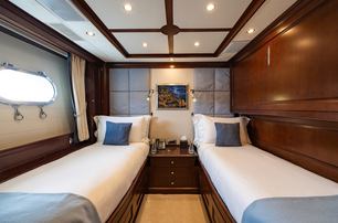 Benetti motor yacht Bunty guest cabin with twin beds 