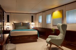 Amels expedition yacht guest cabin with chair 