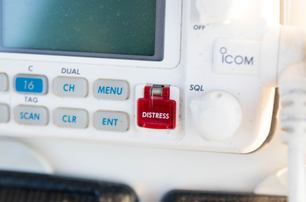 white icom vhf radio set with distress button