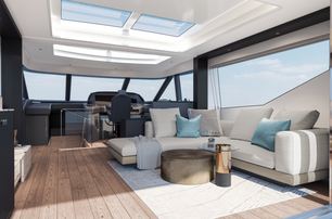 Sunseeker Ocean 156 interior salon wirth white furniture looking forward towards helm station on starboard side