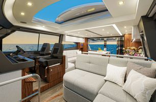 Riviera 645 SUV Series II motor yacht helm station with seating 