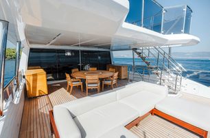 Benetti motor yacht Afina flybridge with lounge and dining area 