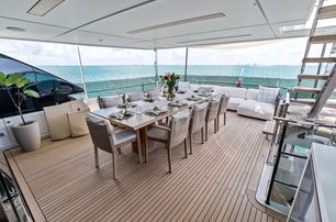 Custom Line superyacht Lumpasaurus flybridge dining area 