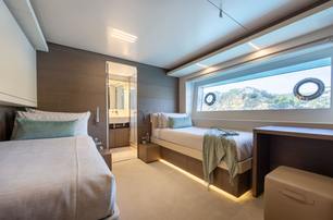  Custom Line motor yacht Kiki V guest cabin with twin beds 