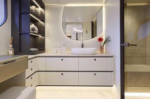 one master en suite with marble detailing 