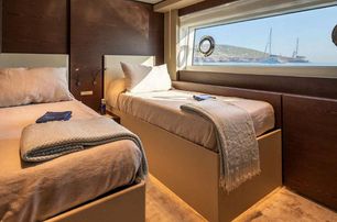 Custom Line motor yacht On guest cabin with twin beds 