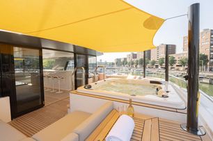 one sun deck with jacuzzi