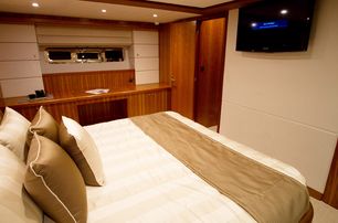 A guest cabin on board a Johnson 70 luxury yacht