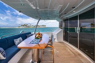 Sunseeker motor yacht Emrys aft deck dining area 