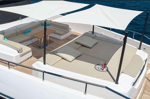 Custom Line motor yacht On foredeck lounge 