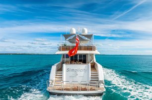 Westport motor yacht Simplicity view of beach club and aft deck