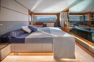 Ferretti 670 motor yacht master cabin with sofa 