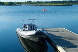 small powerboat on jetty