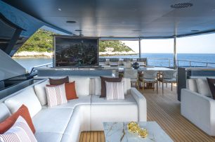 Motor Yacht Sairu sundeck shaded seating and pop up TV