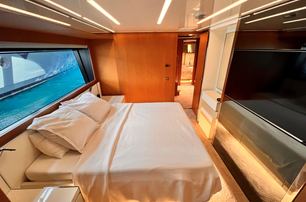 Riva motor yacht No Stress 888 guest cabin with TV 