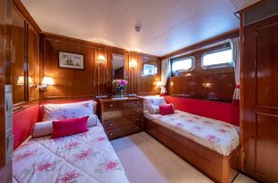 Feadship yacht Monaco guest cabin with twin beds 