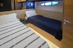  Pershing motor yacht Honey Badger guest cabin with twin beds 