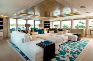 Royal Hakvoort superyacht Jubilee cinema room with white sofa 