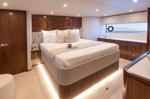 Riviera 6200 yacht master cabin with large window 