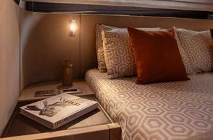 Invictus ST550 motor yacht master cabin bed side table 