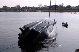 Elling E4 self-righting capsize test as the cruising yacht rolls onto its side