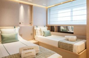 Sanlorenzo motor yacht Tolemai guest cabin with twin beds 