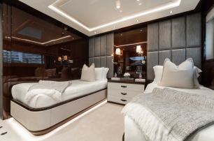 Sunseeker motor yacht Captain Morgan III guest cabin with twin beds 