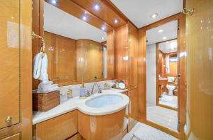 Sanlorenzo motor yacht Cariloy en suite with warm wood finishes  