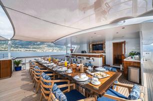 Feadship superyacht Synthesis 66 flybridge bar and dining area 