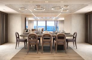 Interior dining area onboard motor yacht ASANI, with a long table surrounded by eight chairs