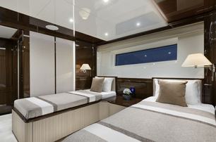 First Lazzara UHV 100 yacht guest cabin with twin beds 