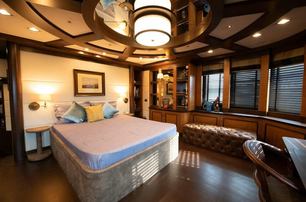 Superyacht Serenity II guest cabin with multiple windows 