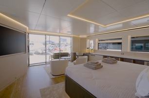 Numarine 40MXP bridge deck owner's suite showing lounge seating and panoramic glazing