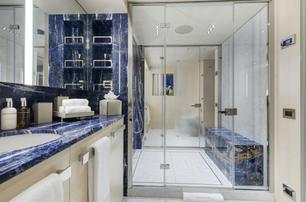confessa master en suite with blue marble detailing 