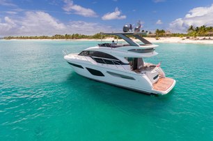 Princess F55 mk1 at anchor in blue sea